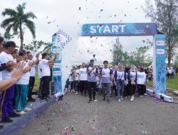 Jalan Sehat Bersama Masyarakat Aceh Peringati HUT BUMN